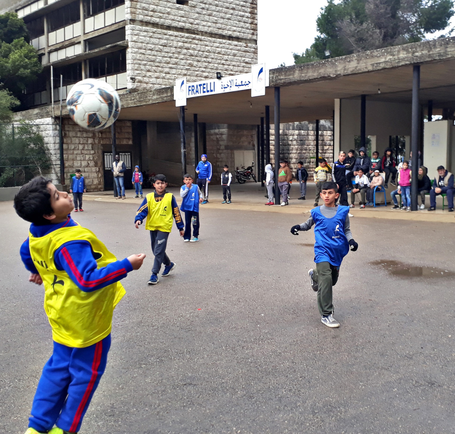 Students playing Football outside the Fratelli centre