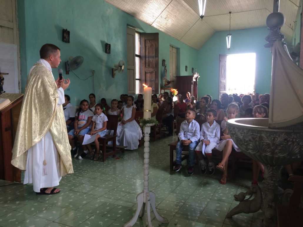 Local children attending mass